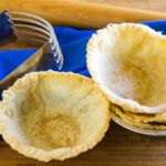 Four small pastry tart shells