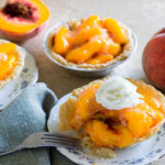 Fresh peach pie tart with whipped cream