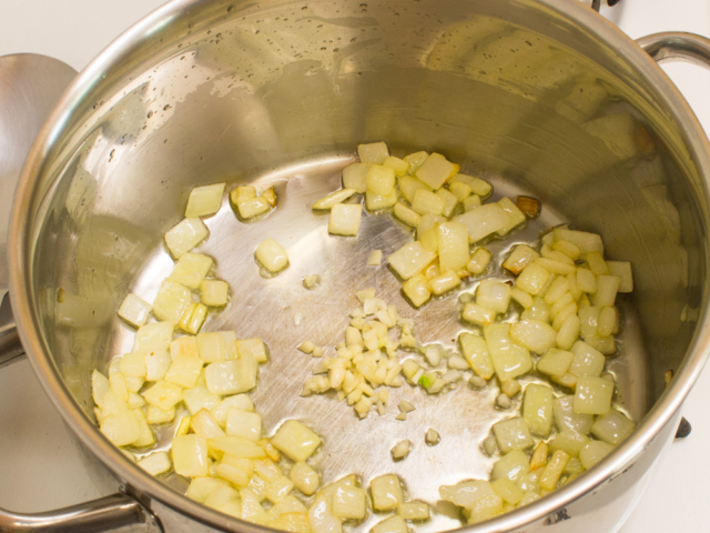 Olive oil, onions, and garlic in saucepan