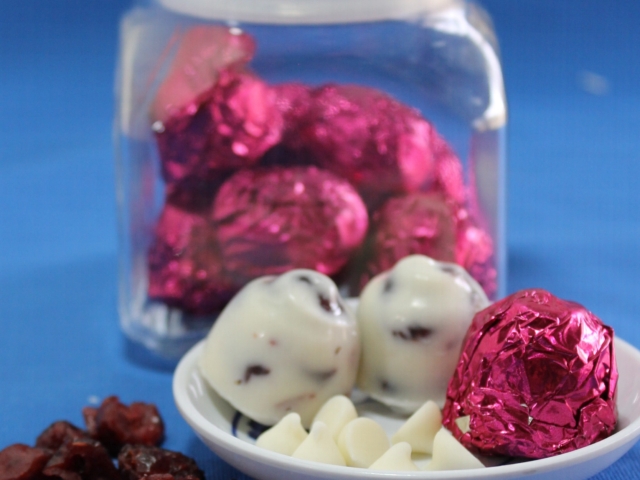Cranberry clusters wrapped in foil and placed in candy jar.