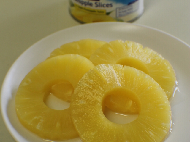 Drain four pineapple rings and reserve juice