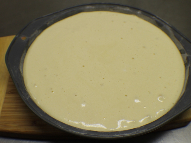 Batter poured over topping in pan