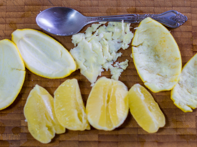 Remove white pith from lemon peels.