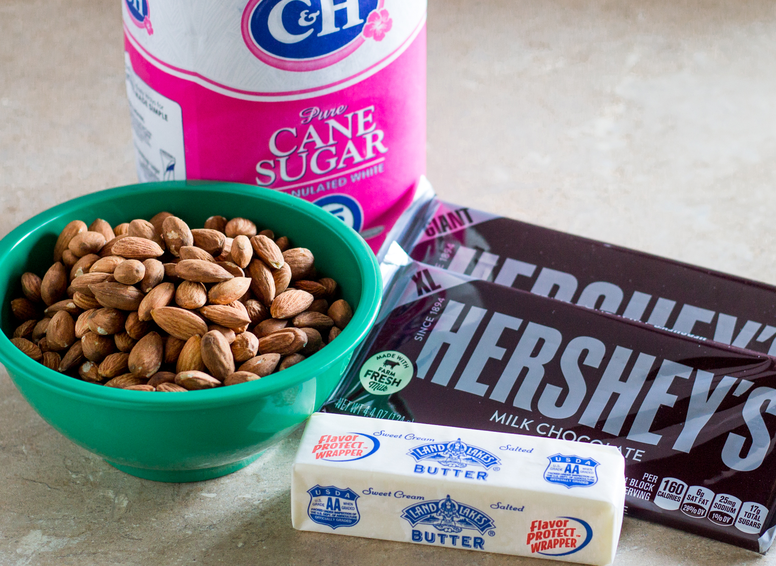 Ingredients for English toffee sugar butter almonds chocolate