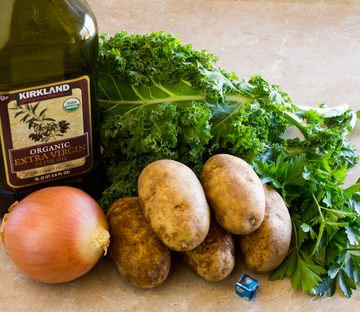 Ingredients for soup kale potatoes parsley onion olive oil bouillon