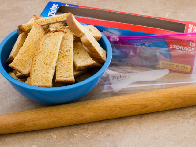 Bread sticks with rolling pin and gallon Ziplock bag.