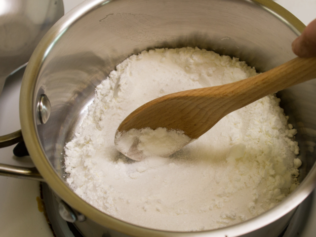 Sugar and cornstarch stirred together in saucepan.