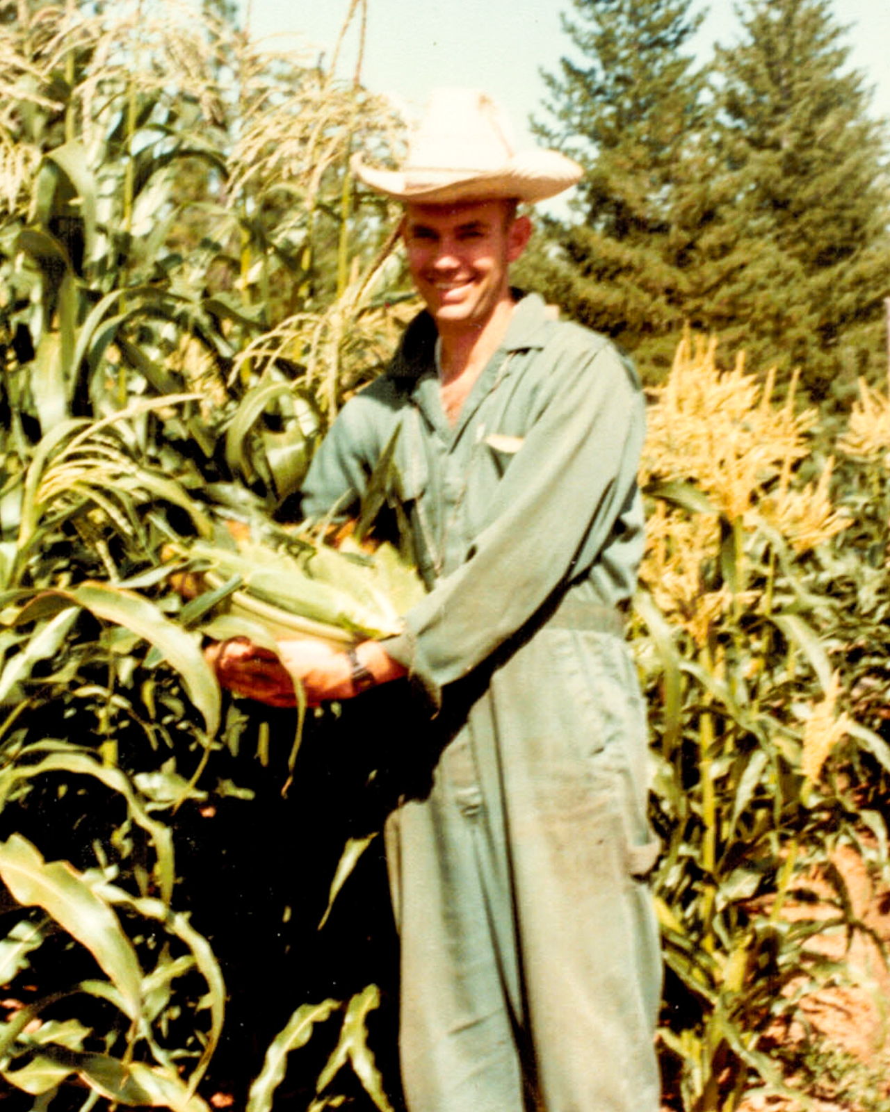 Rev. McKinney with basket of freshly picked corn.