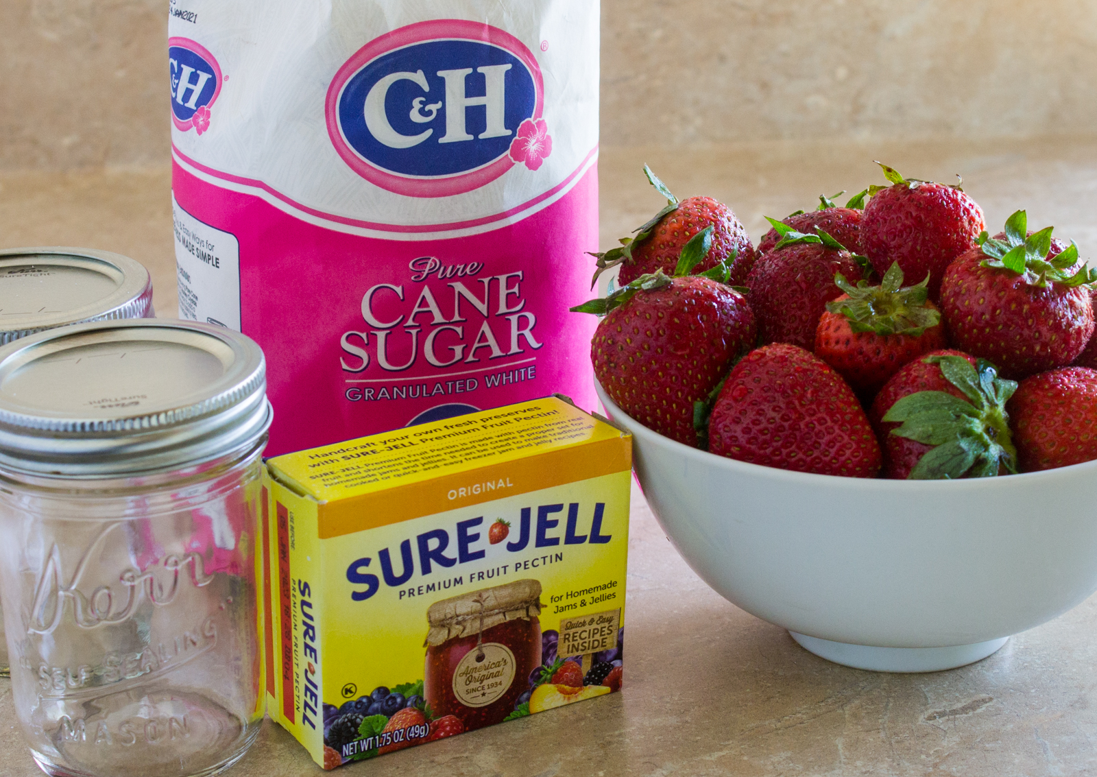Ingredients strawberries, Sure-jell pectin, sugar and 8 ounce jars
