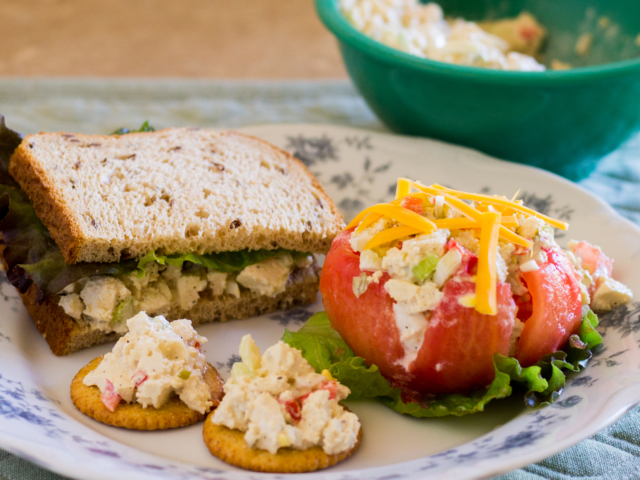 Vegetarian chicken salad tofu in sandwich, on crackers, and in stuffed tomato